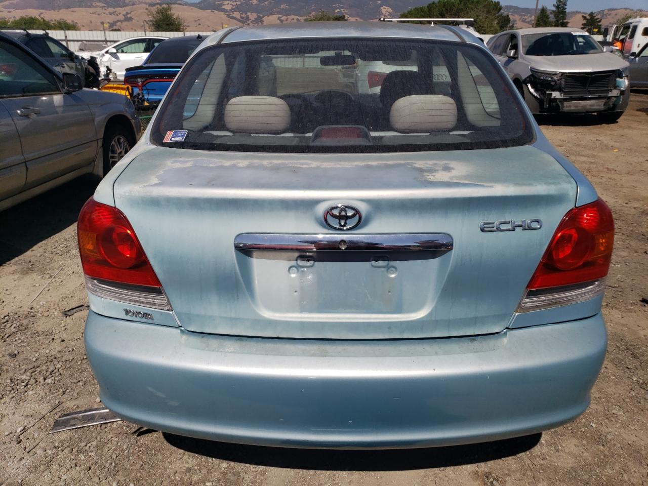 2003 Toyota Echo VIN: JTDAT123430271897 Lot: 64721174