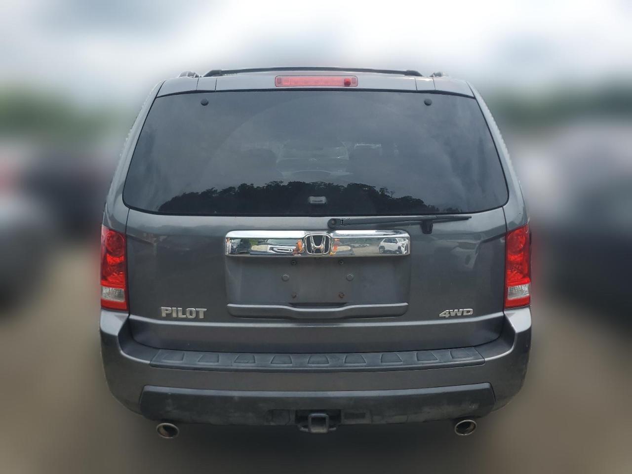 2011 Honda Pilot Exl VIN: 5FNYF4H5XBB069873 Lot: 64706454