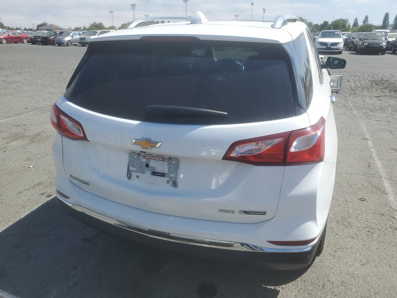 2018 Chevrolet Equinox Premier VIN: 2GNAXVEV4J6130915 Lot: 62103934