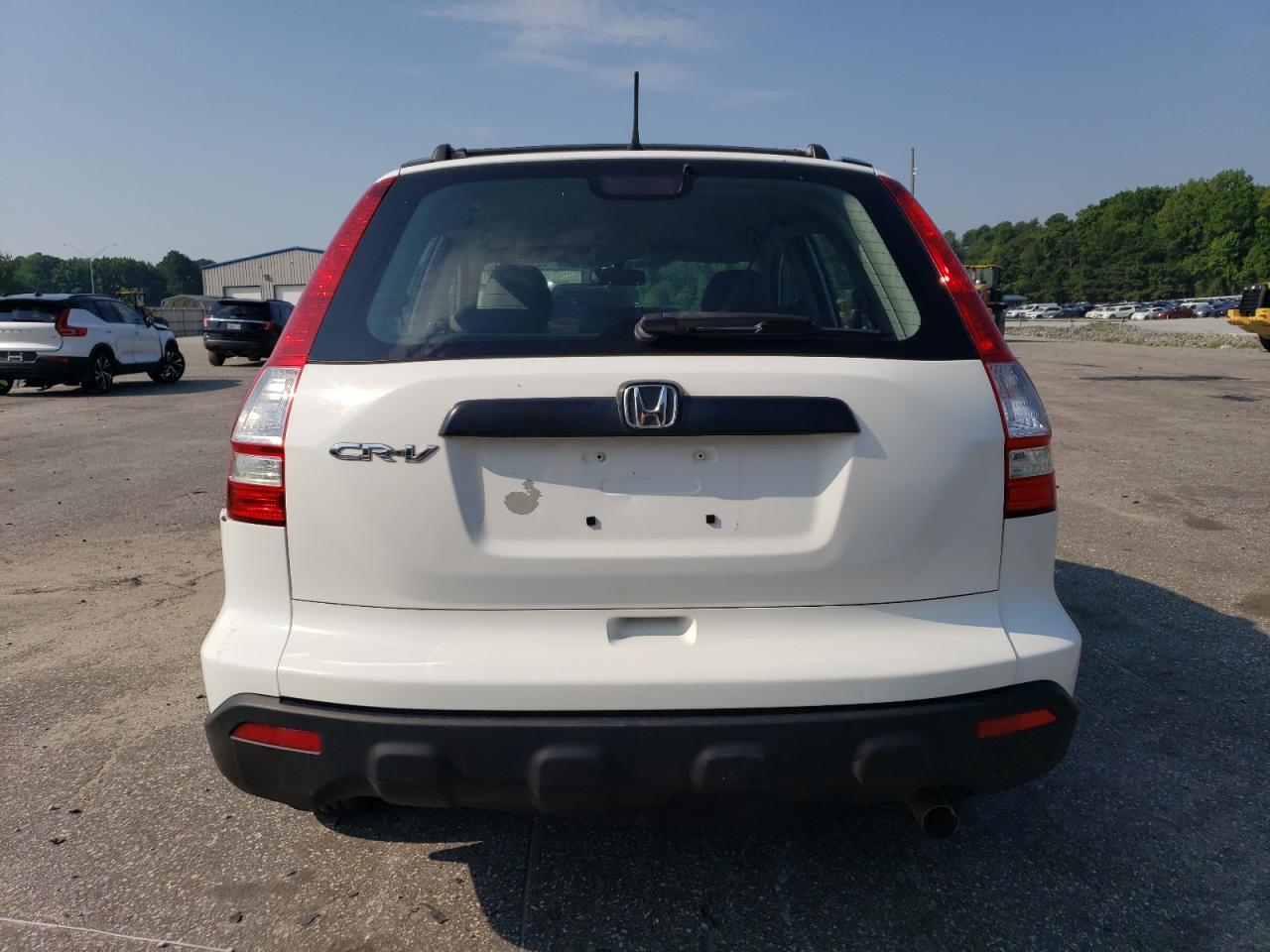 2009 Honda Cr-V Lx VIN: 3CZRE38389G703471 Lot: 62858404