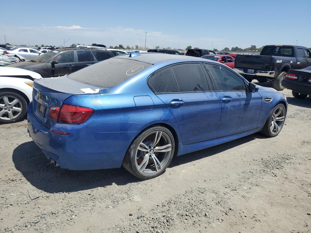2013 BMW M5 VIN: WBSFV9C59DD095799 Lot: 63148214