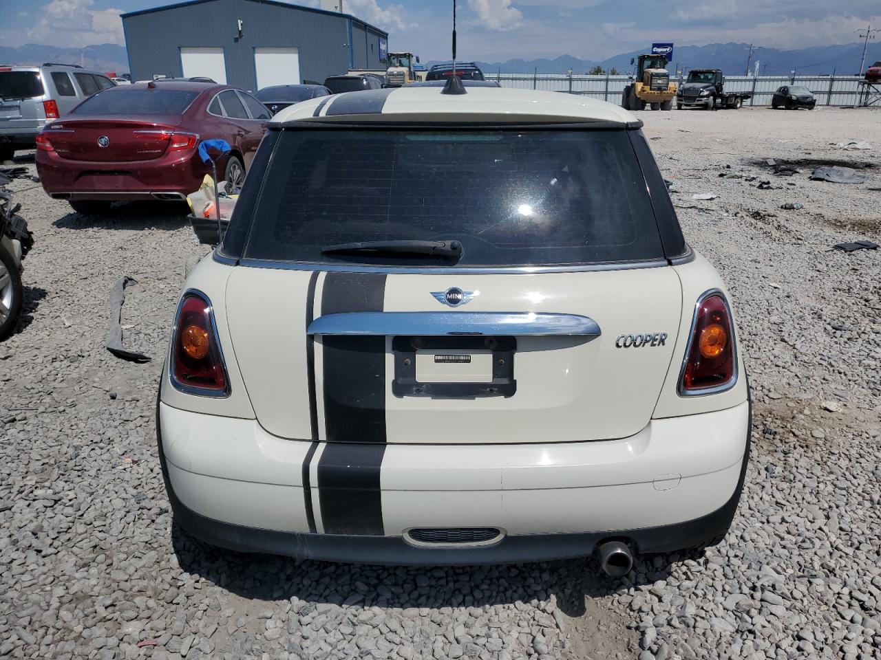 2009 Mini Cooper VIN: WMWMF33539TT69081 Lot: 63556374