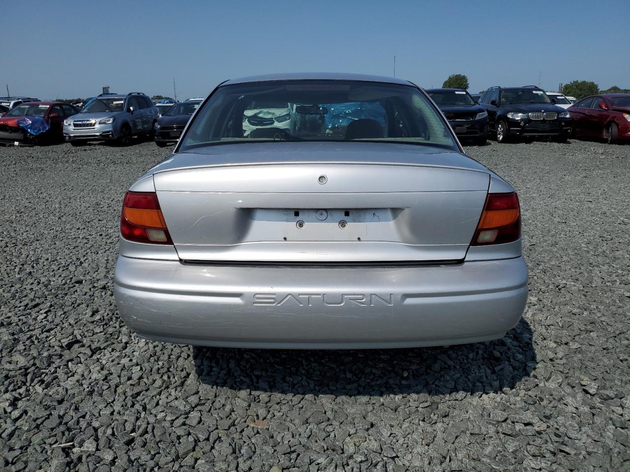 2002 Saturn Sl VIN: 1G8ZF52852Z203853 Lot: 64016894