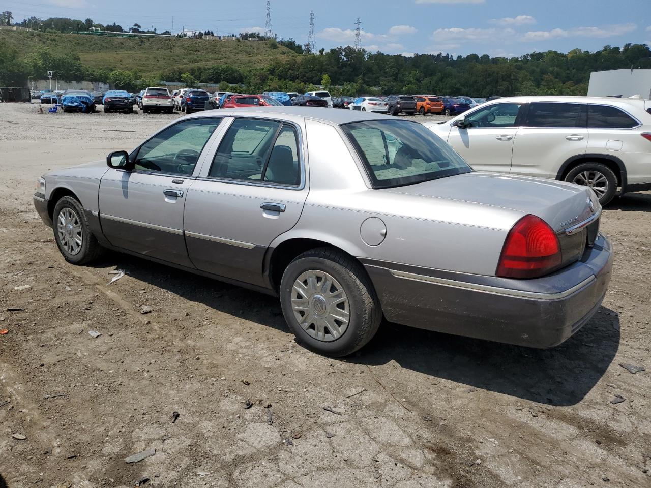 2007 Mercury Grand Marquis Gs VIN: 2MEFM74W47X619362 Lot: 64862454