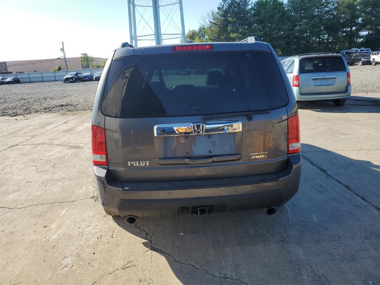 2011 Honda Pilot Touring VIN: 5FNYF4H94BB048911 Lot: 61439934