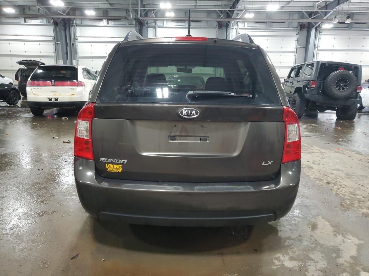 2009 Kia Rondo Base VIN: KNAFG528397269679 Lot: 64802864