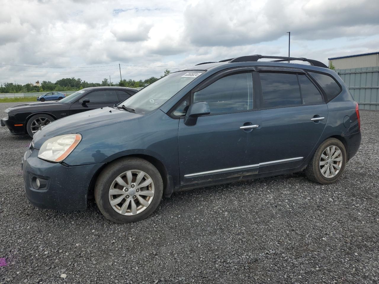 2009 Kia Rondo Base VIN: KNAFG528197293253 Lot: 63606024