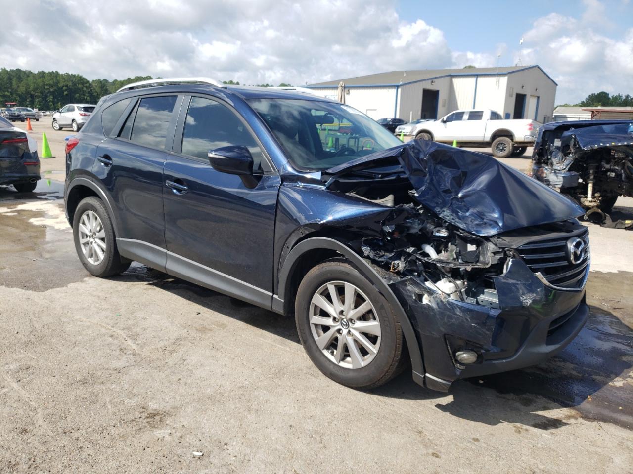 2016 Mazda Cx-5 Touring VIN: JM3KE2CYXG0800037 Lot: 61928534