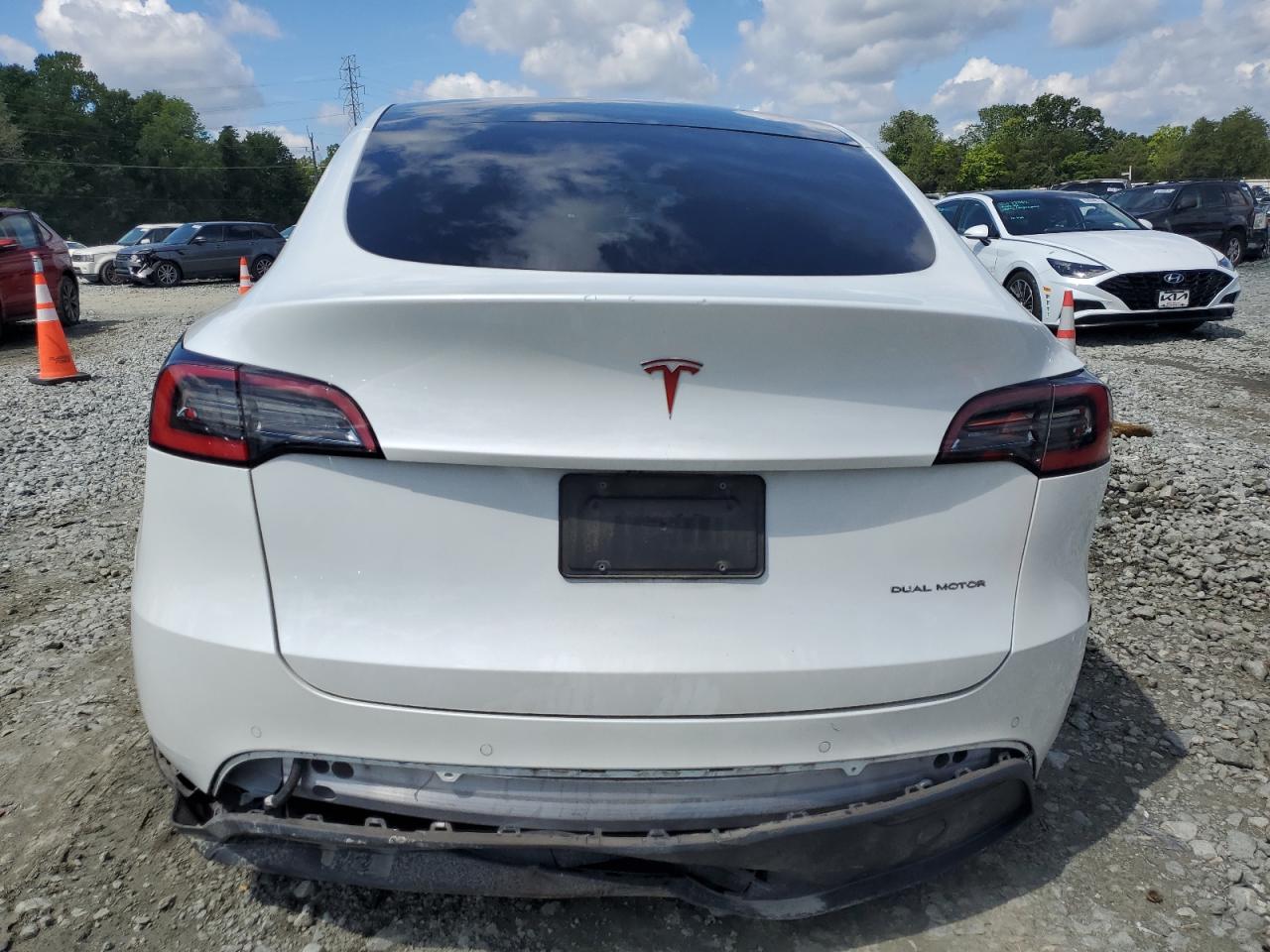 2021 Tesla Model Y VIN: 5YJYGDEE4MF106243 Lot: 64415124