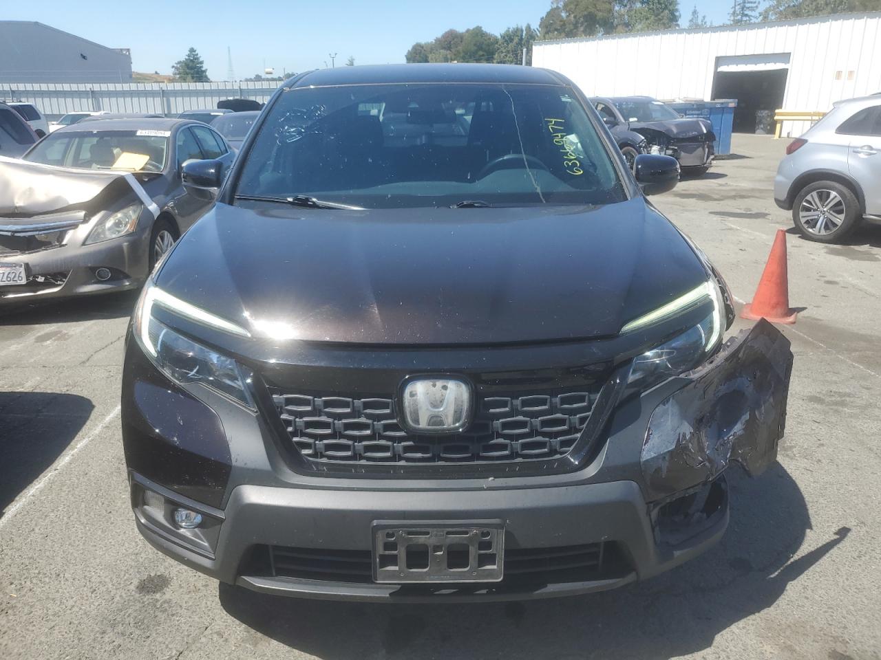 2019 Honda Passport Sport VIN: 5FNYF7H27KB004048 Lot: 63669474