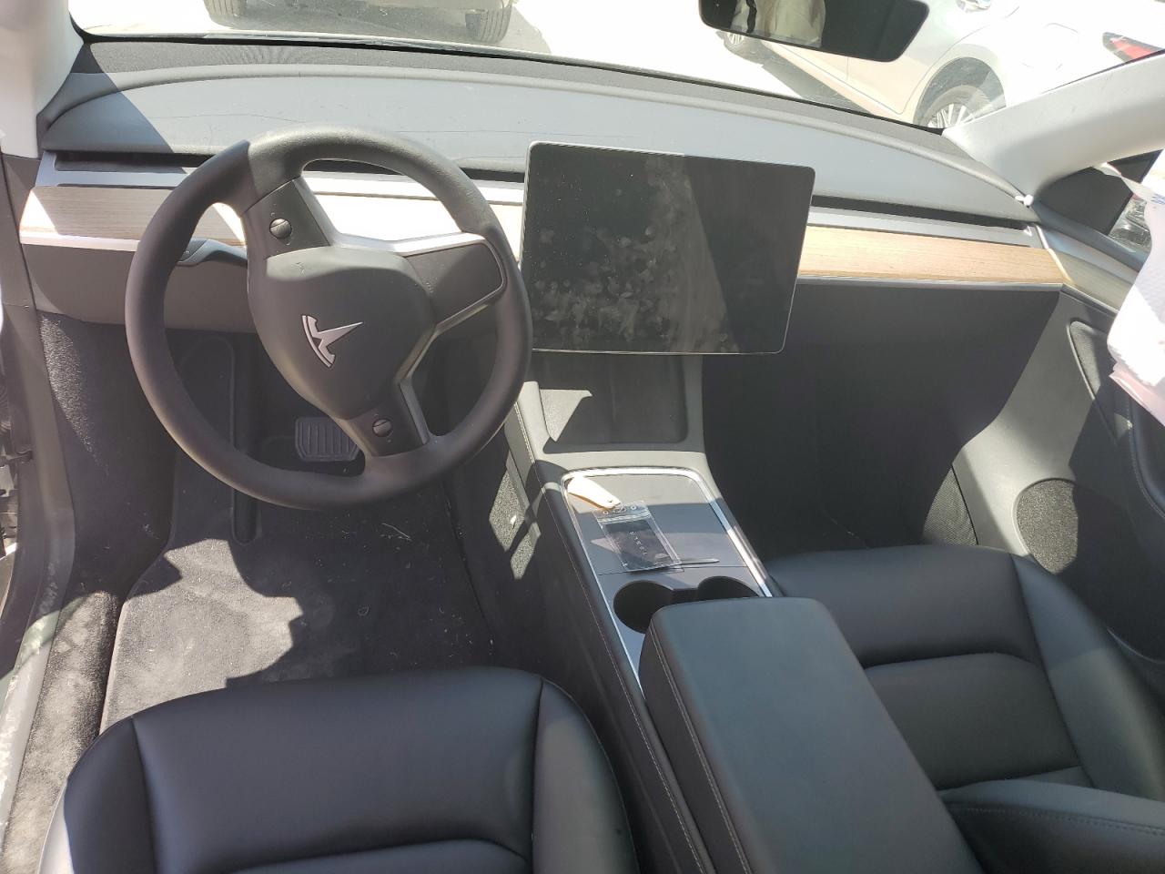 2023 Tesla Model Y VIN: 7SAYGDEE0PA099280 Lot: 63932044