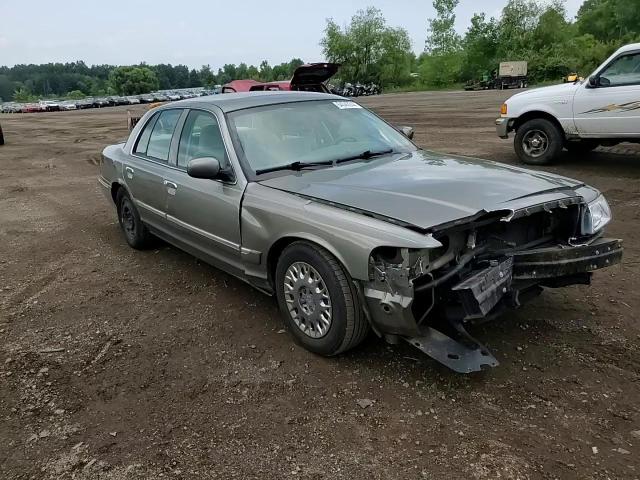 2003 Mercury Grand Marquis Gs VIN: 2MEFM74W23X705134 Lot: 64542244