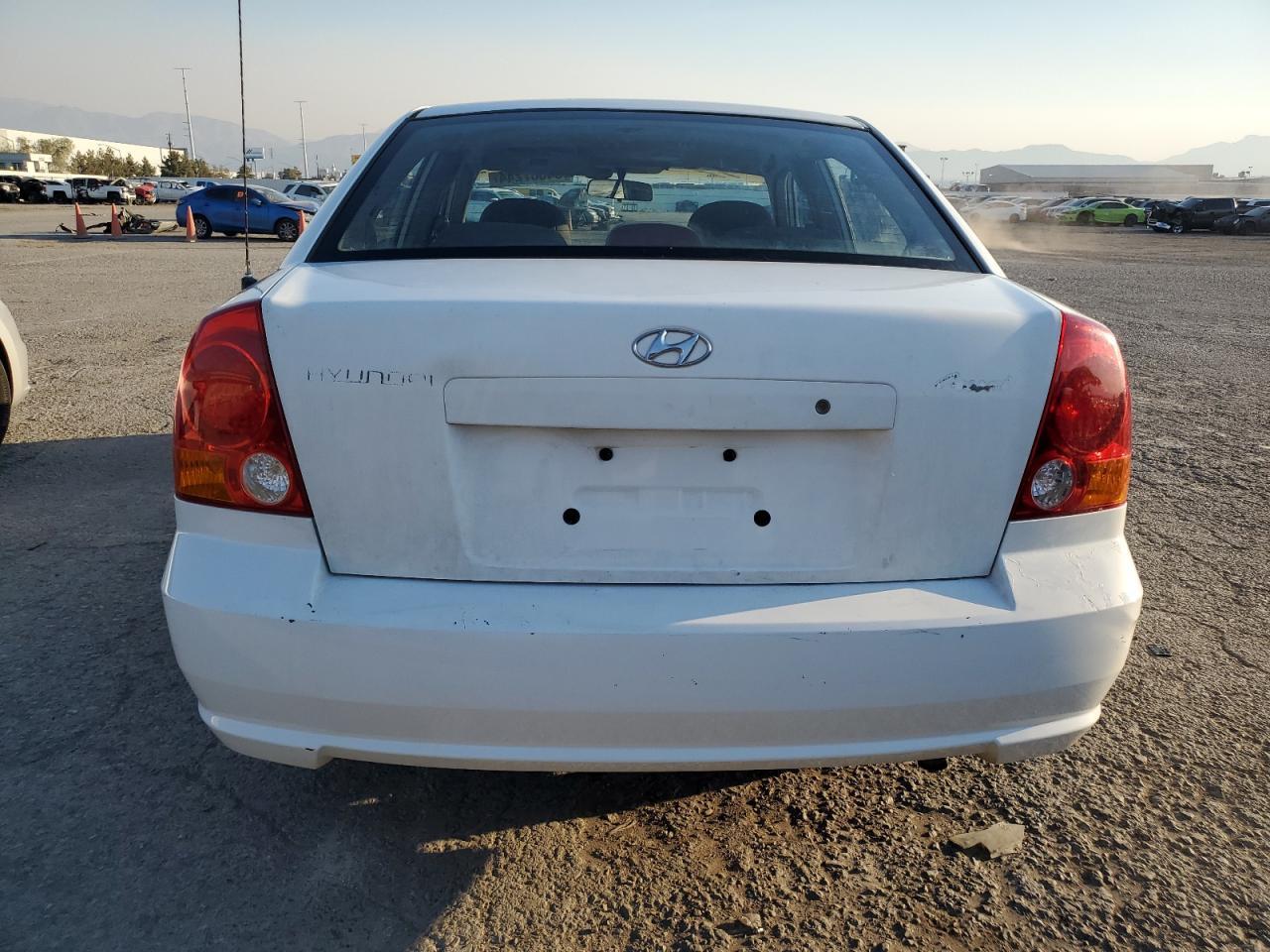 2003 Hyundai Accent Gl VIN: KMHCG45C33U471359 Lot: 64687244