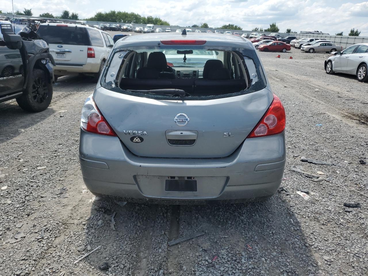 2009 Nissan Versa S VIN: 3N1BC13E09L404545 Lot: 63896934