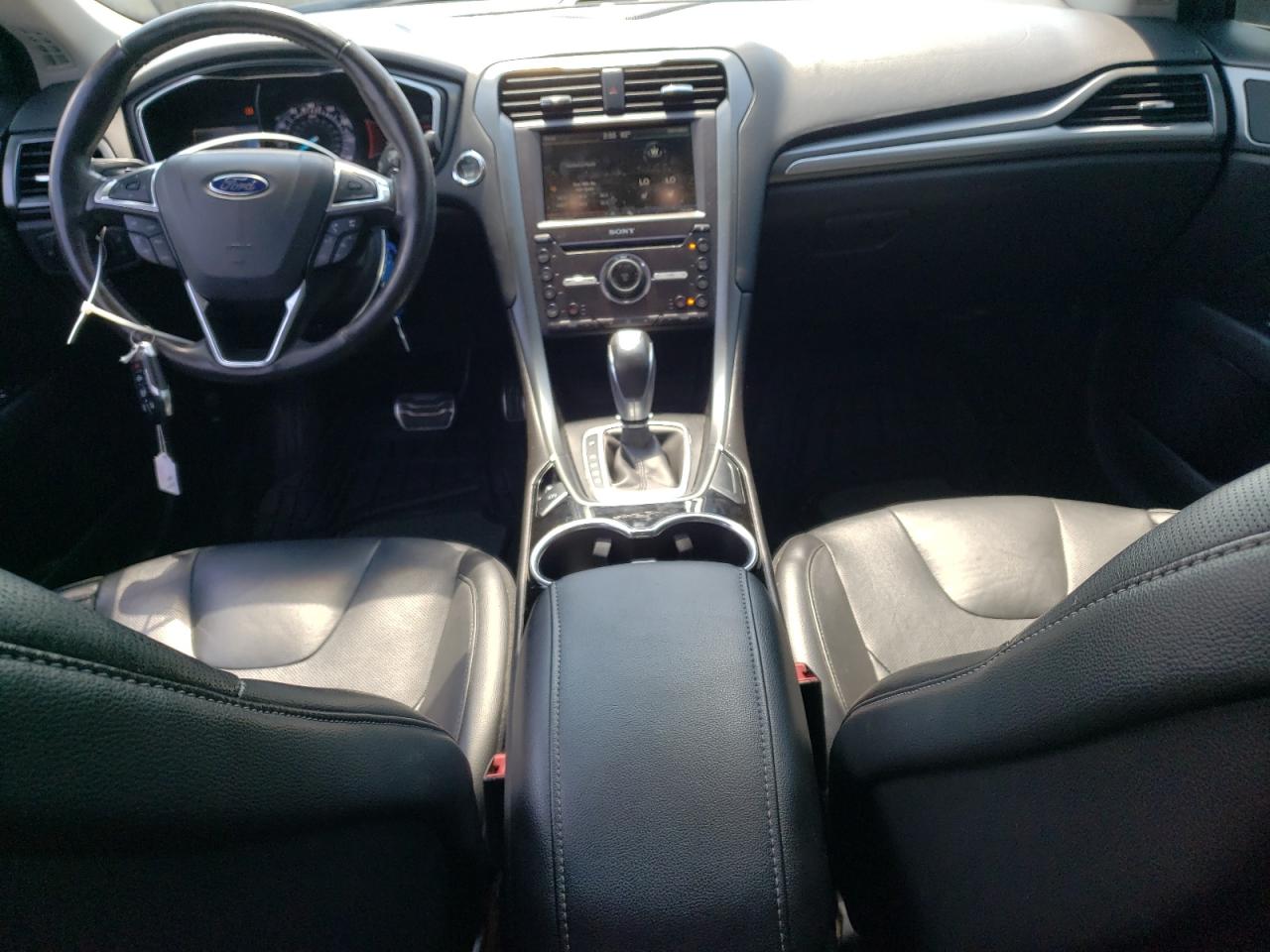 2016 Ford Fusion Titanium VIN: 3FA6P0K94GR179810 Lot: 63034124