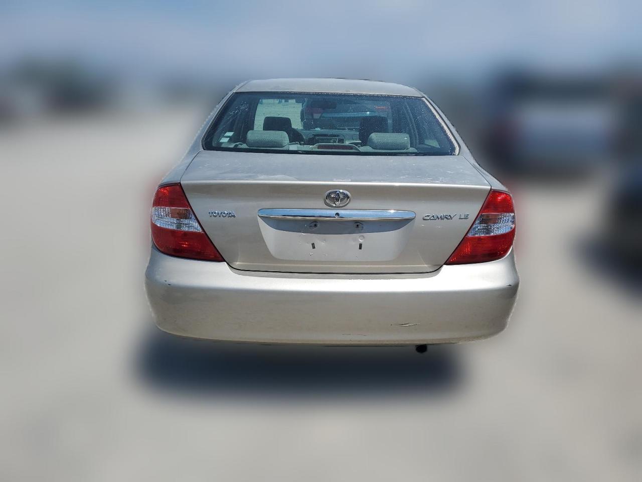 2003 Toyota Camry Le VIN: 4T1BE32KX3U710395 Lot: 63069274