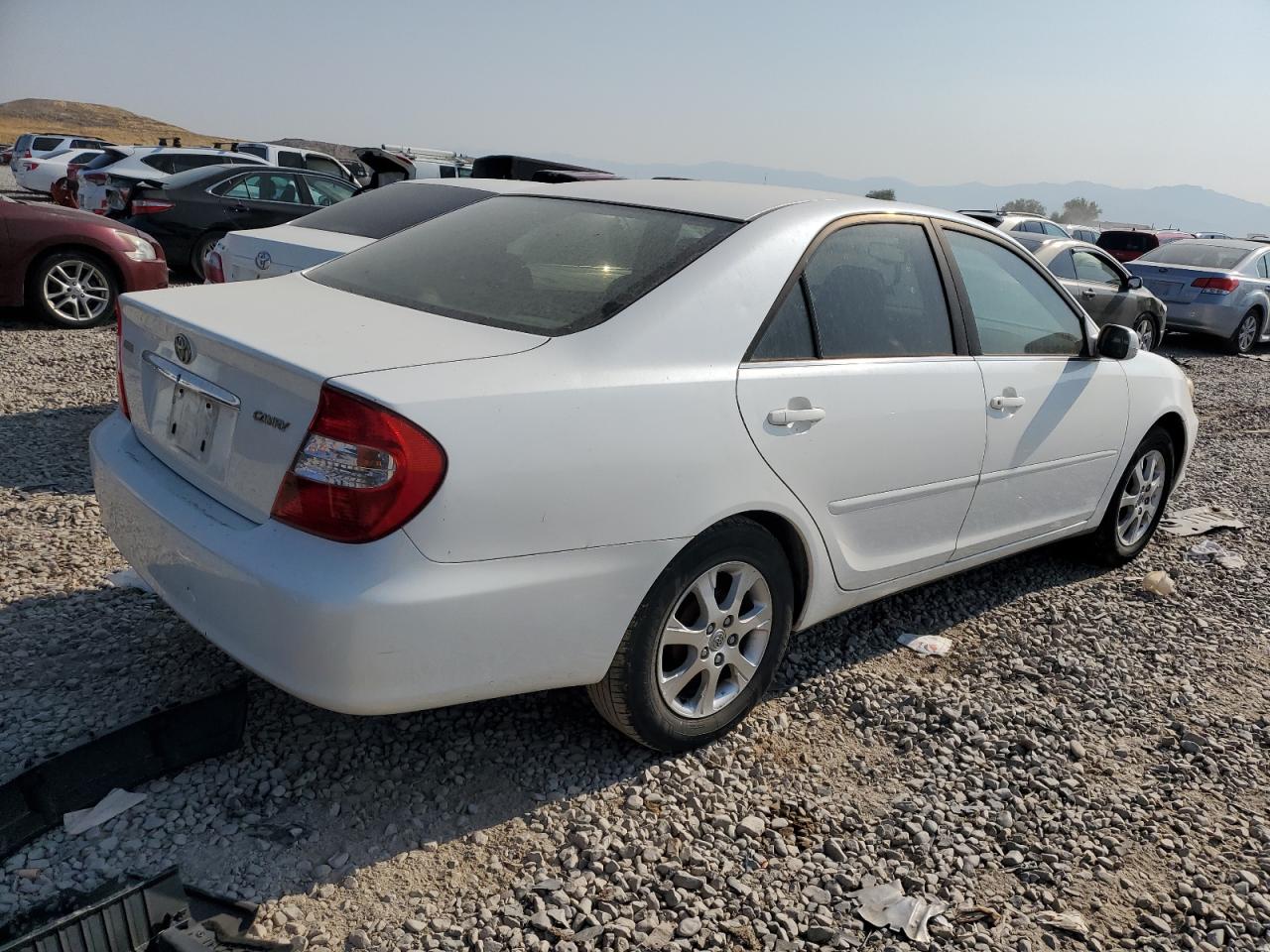 2004 Toyota Camry Le VIN: JTDBE32K540250978 Lot: 64215554