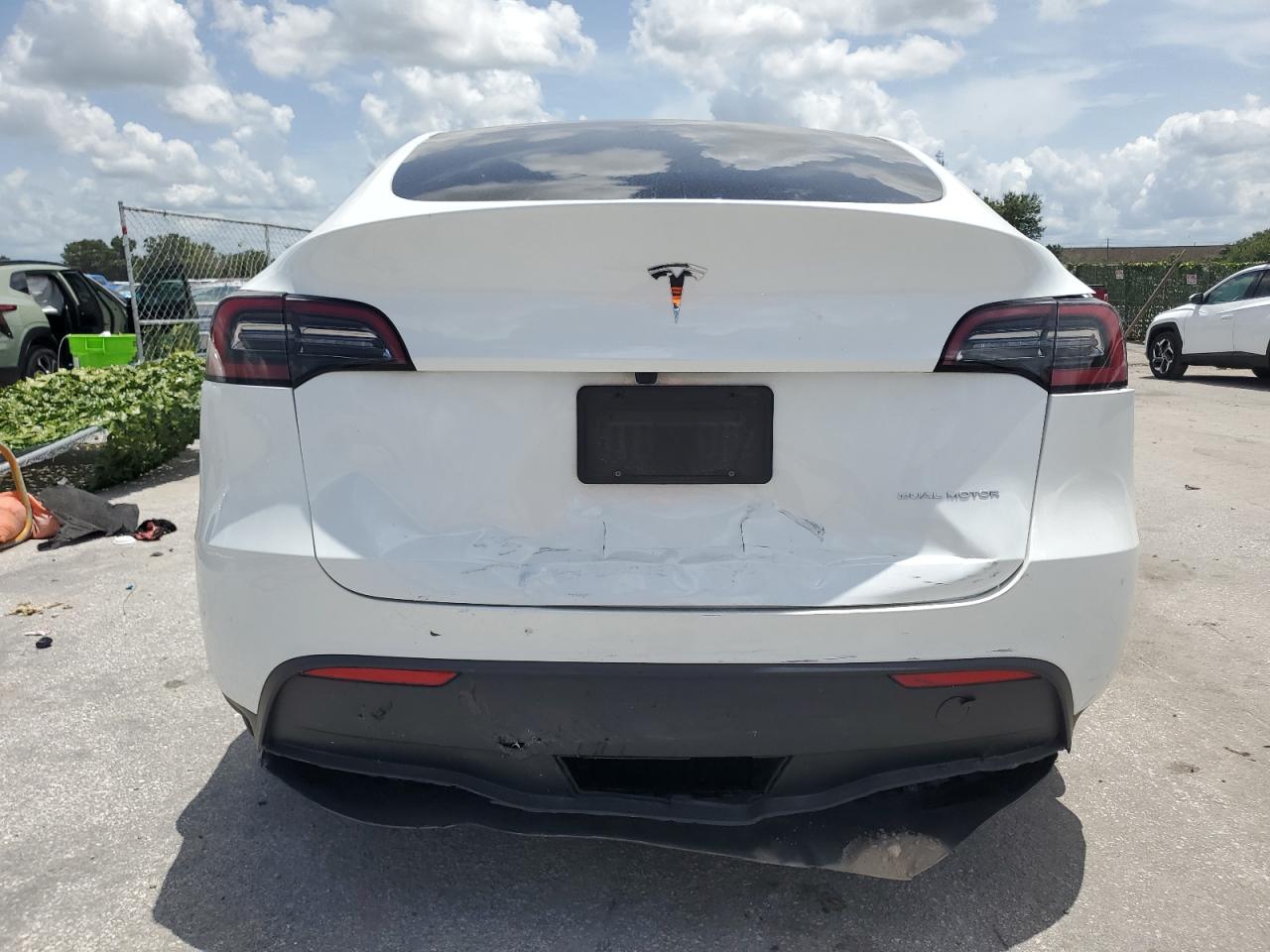 2023 Tesla Model Y VIN: 7SAYGDEE7PA140035 Lot: 64046614