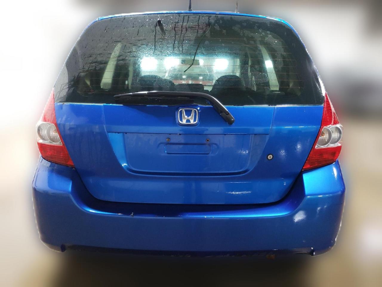 2008 Honda Fit VIN: JHMGD38438S062891 Lot: 62986644