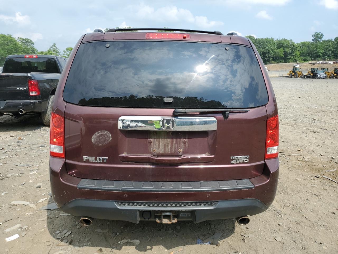 2012 Honda Pilot Touring VIN: 5FNYF4H93CB071808 Lot: 61939464