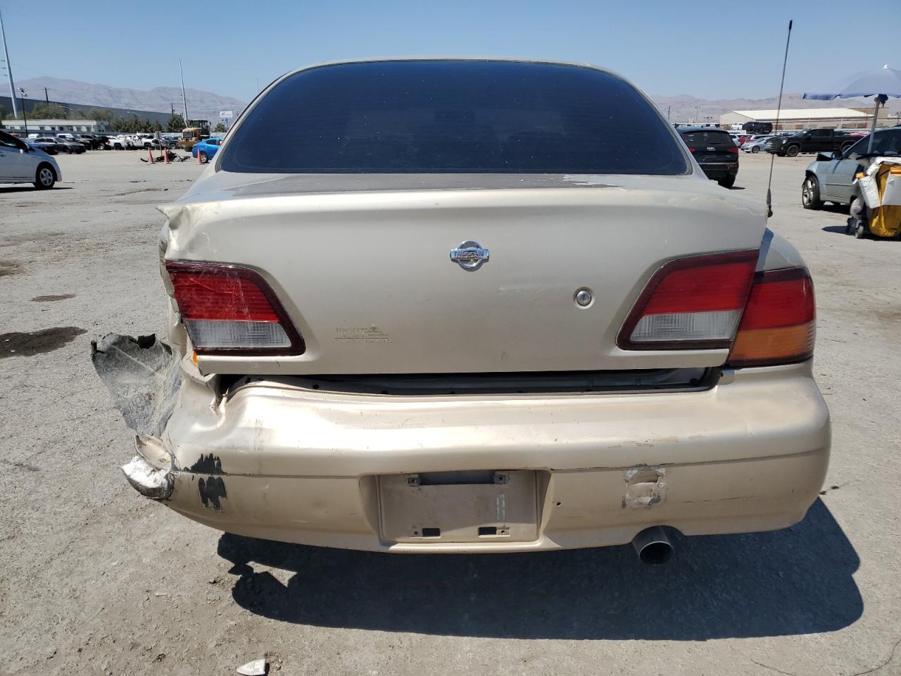 1998 Nissan Maxima Gle VIN: JN1CA21DXWM929205 Lot: 65010354