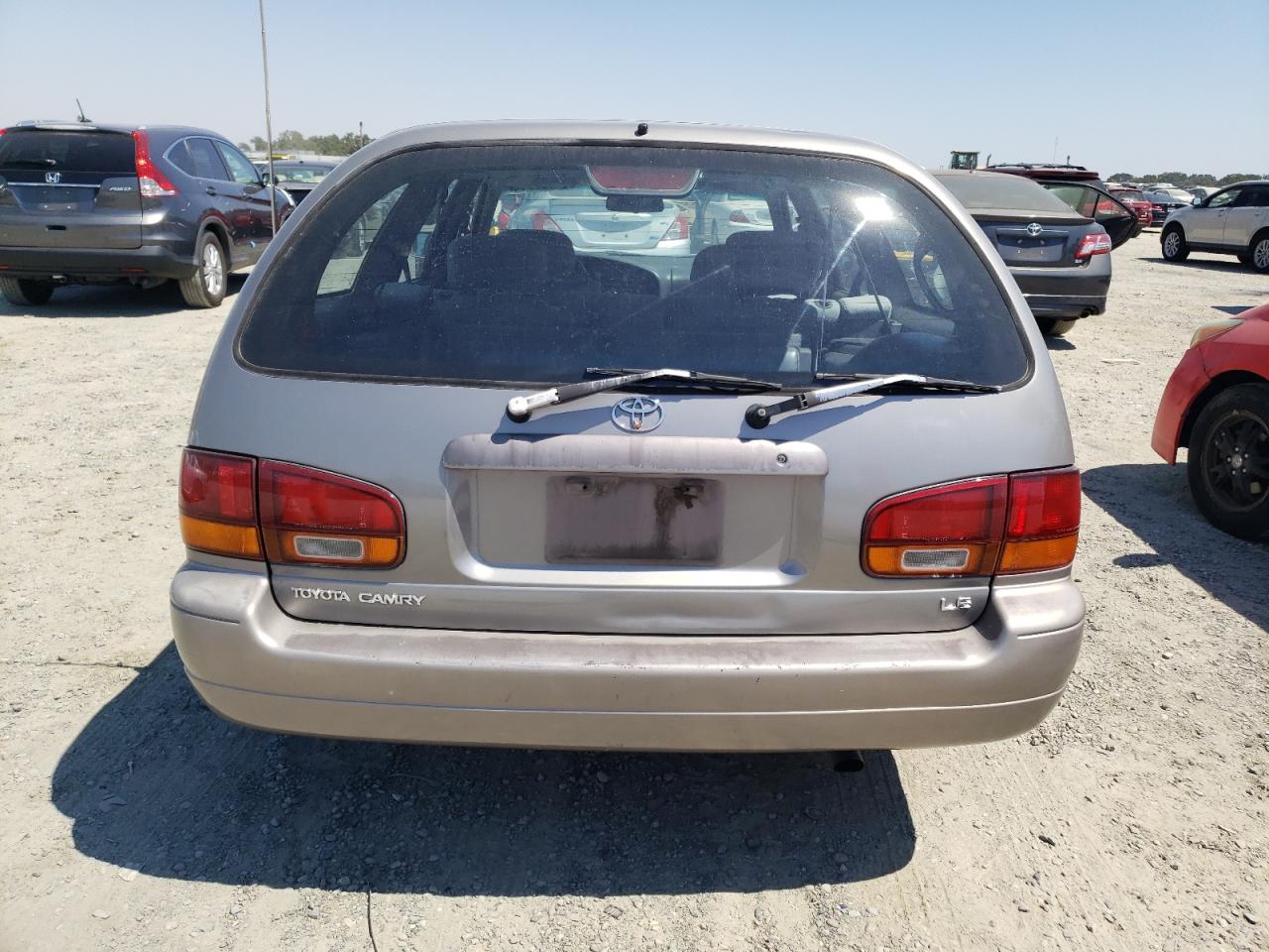 1995 Toyota Camry Le VIN: 4T1SK12W7SU484489 Lot: 61963714