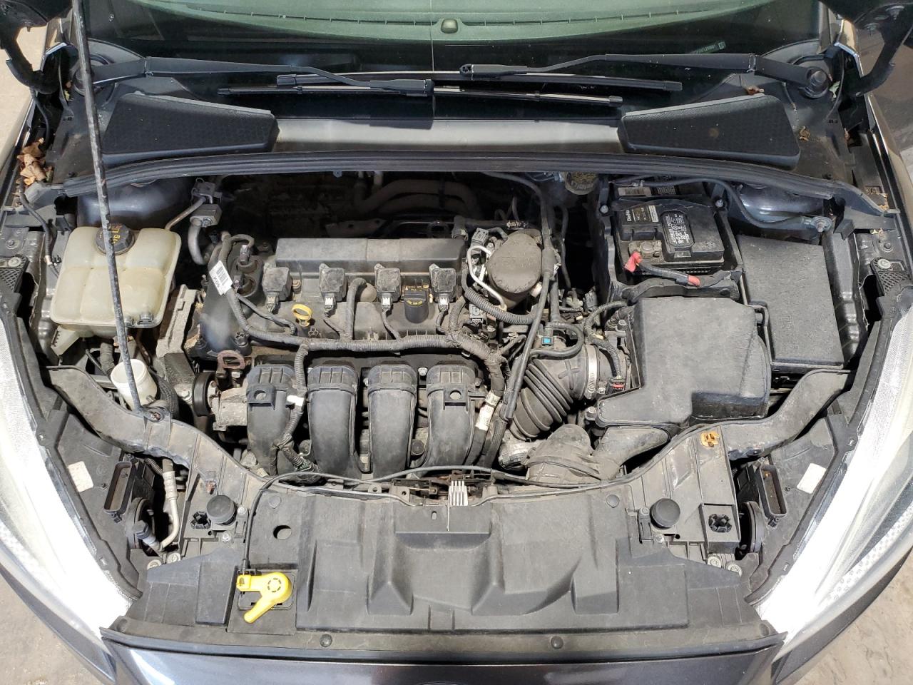 2015 Ford Focus Se VIN: 1FADP3F2XFL299081 Lot: 63882014