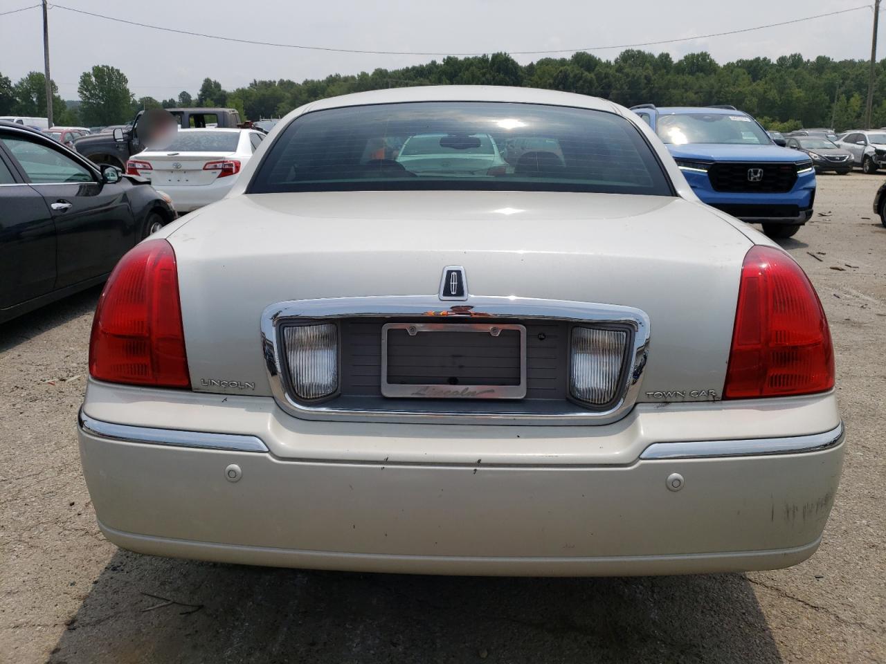 2004 Lincoln Town Car Ultimate VIN: 1LNHM83W14Y615729 Lot: 64554564
