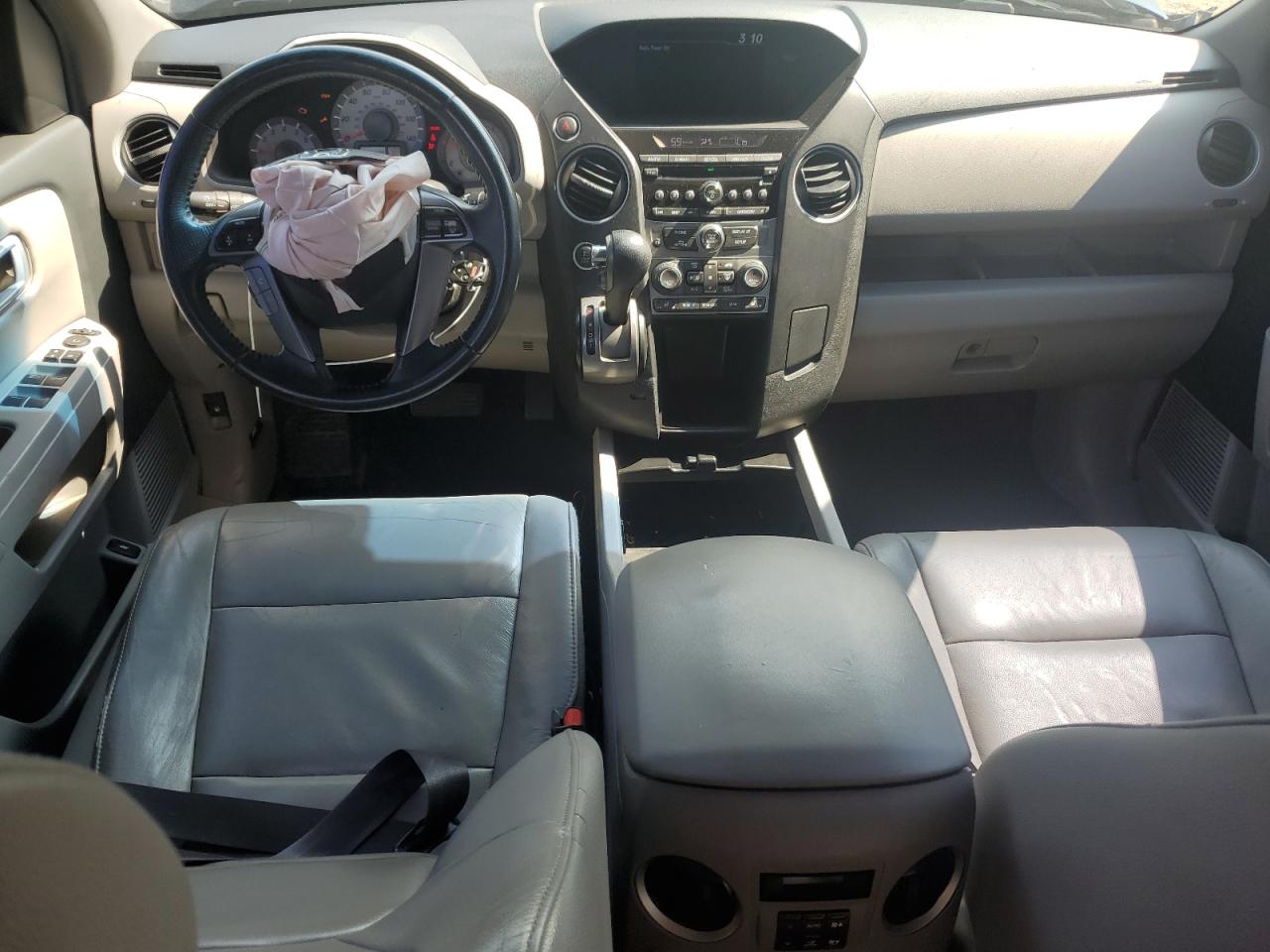 2012 Honda Pilot Exl VIN: 5FNYF4H55CB033056 Lot: 63413054