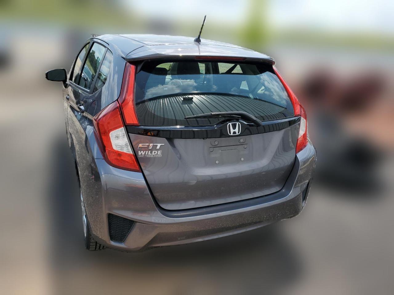 2015 Honda Fit Lx VIN: 3HGGK5H59FM785180 Lot: 63276294