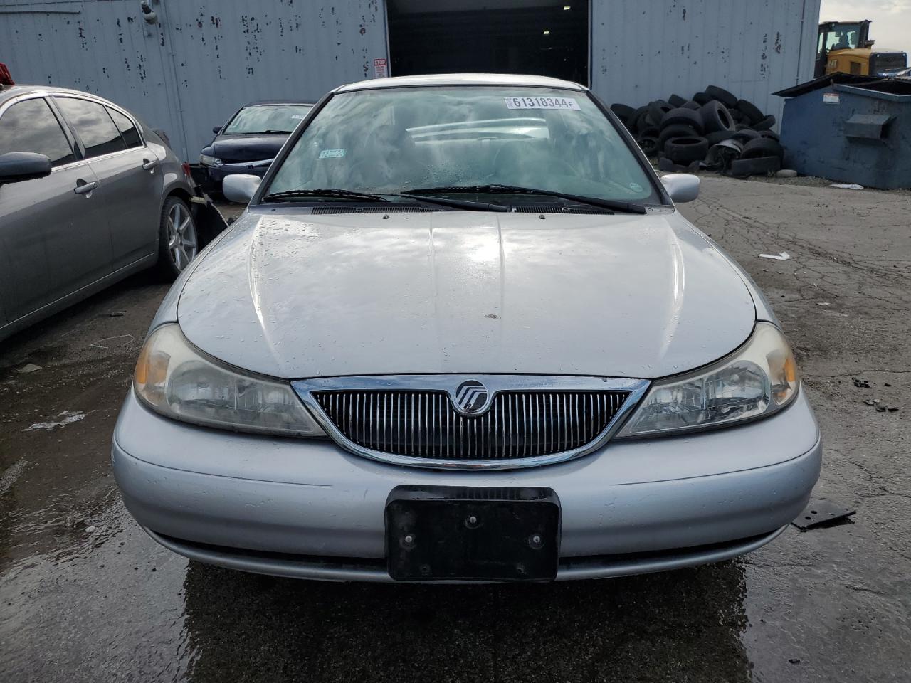 1999 Mercury Mystique Ls VIN: 1MEFM66L5XK610640 Lot: 61318344