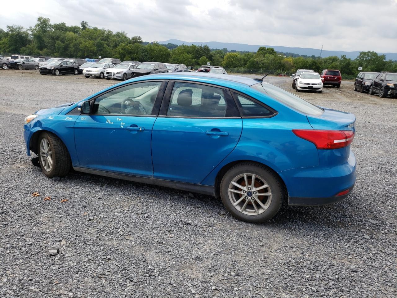 2015 Ford Focus Se VIN: 1FADP3F25FL233621 Lot: 63860844