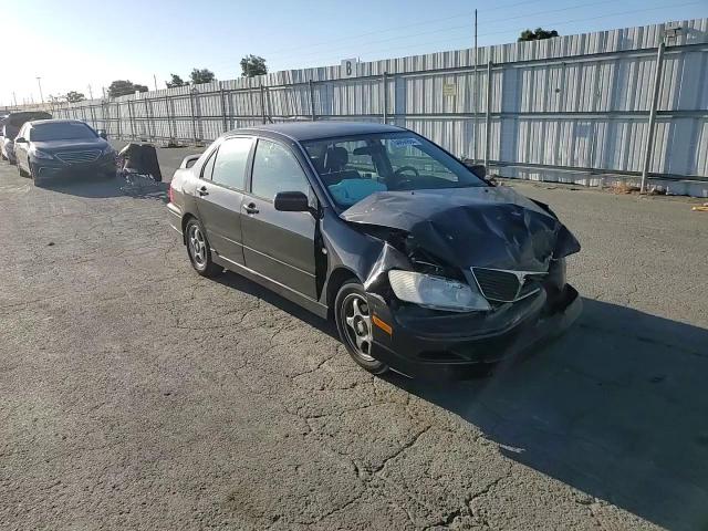 2002 Mitsubishi Lancer Oz Rally VIN: JA3AJ86E52U036604 Lot: 64894684