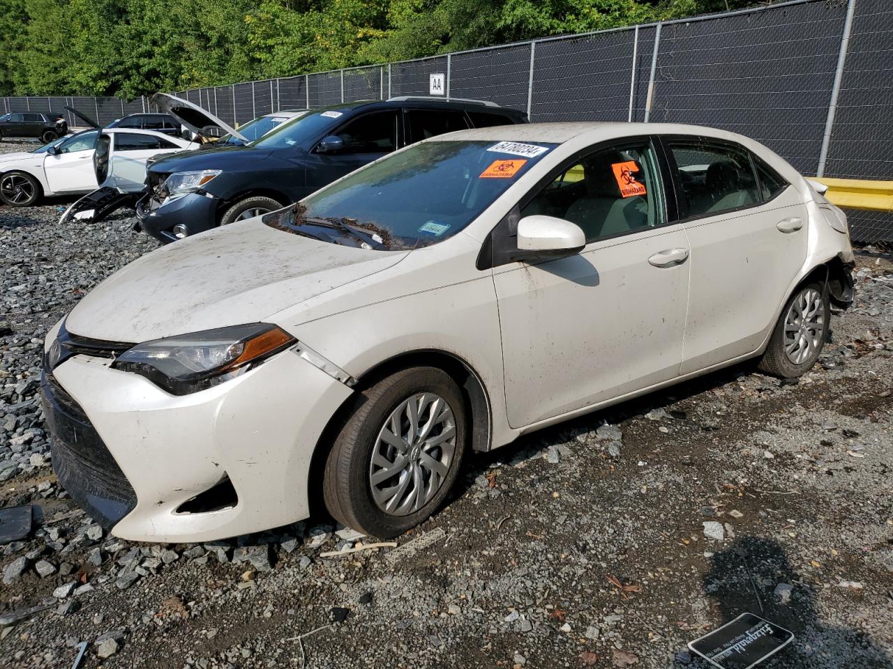 2017 Toyota Corolla L VIN: 5YFBURHE9HP675400 Lot: 64780234