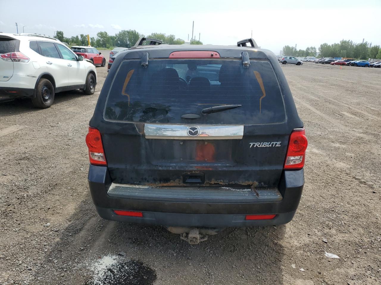 2011 Mazda Tribute I VIN: 4F2CY0C74BKM05106 Lot: 64842864