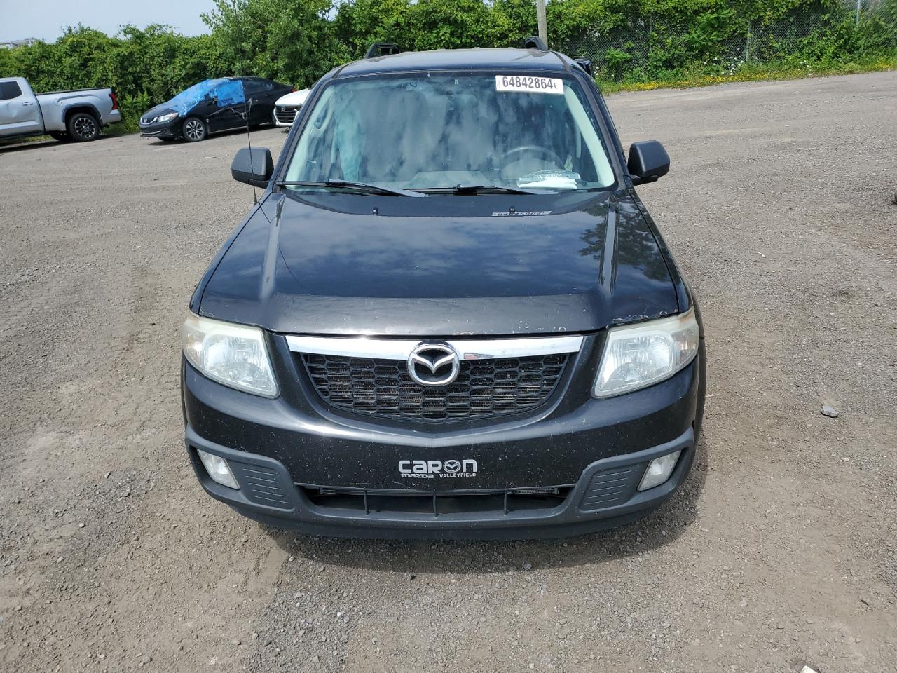 2011 Mazda Tribute I VIN: 4F2CY0C74BKM05106 Lot: 64842864