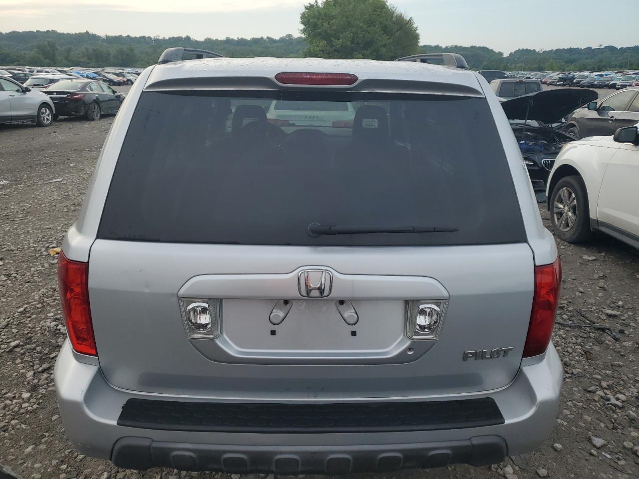 2003 Honda Pilot Ex VIN: 2HKYF18413H597777 Lot: 64952954