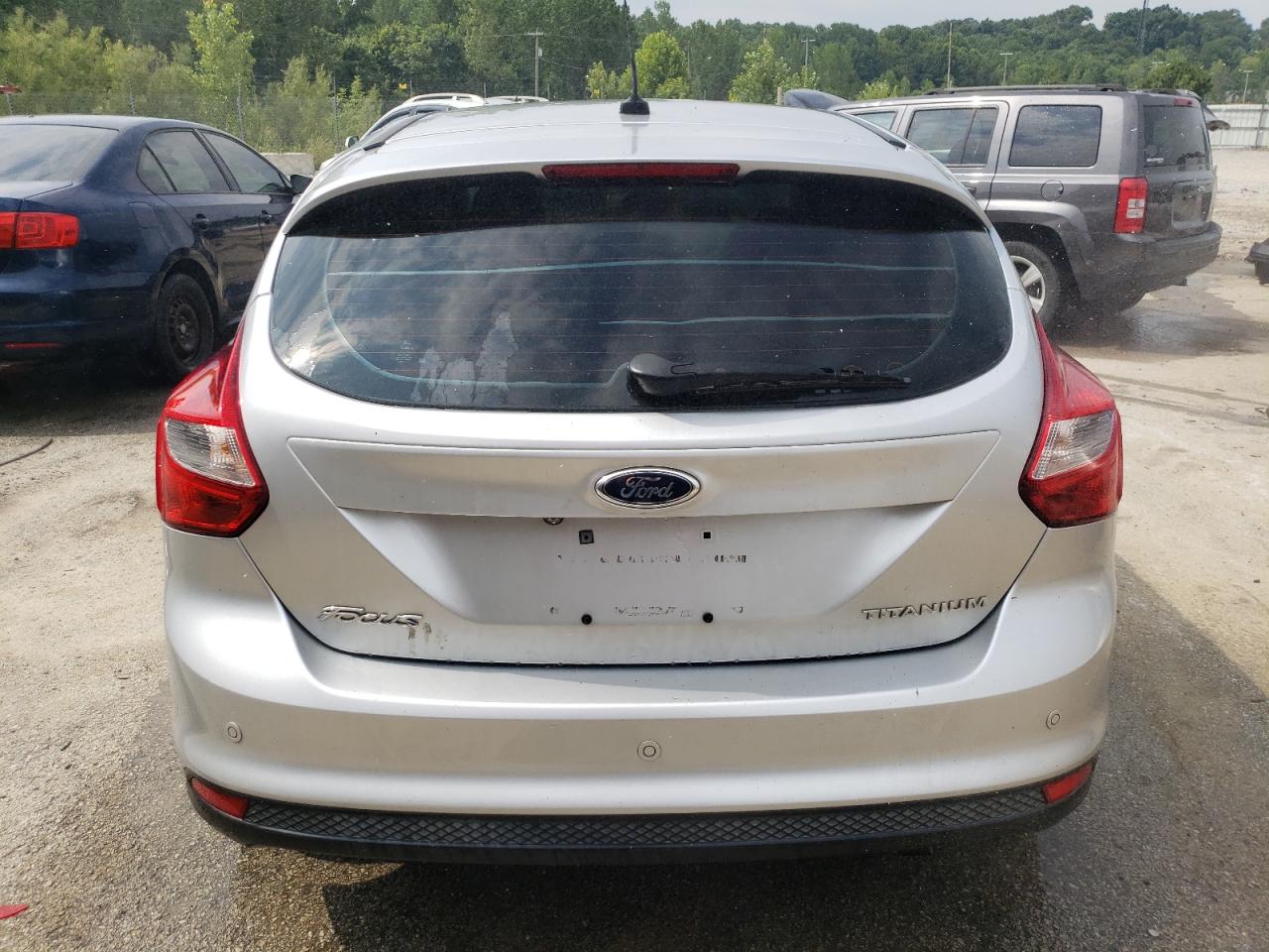 2013 Ford Focus Titanium VIN: 1FADP3N26DL177753 Lot: 61398094