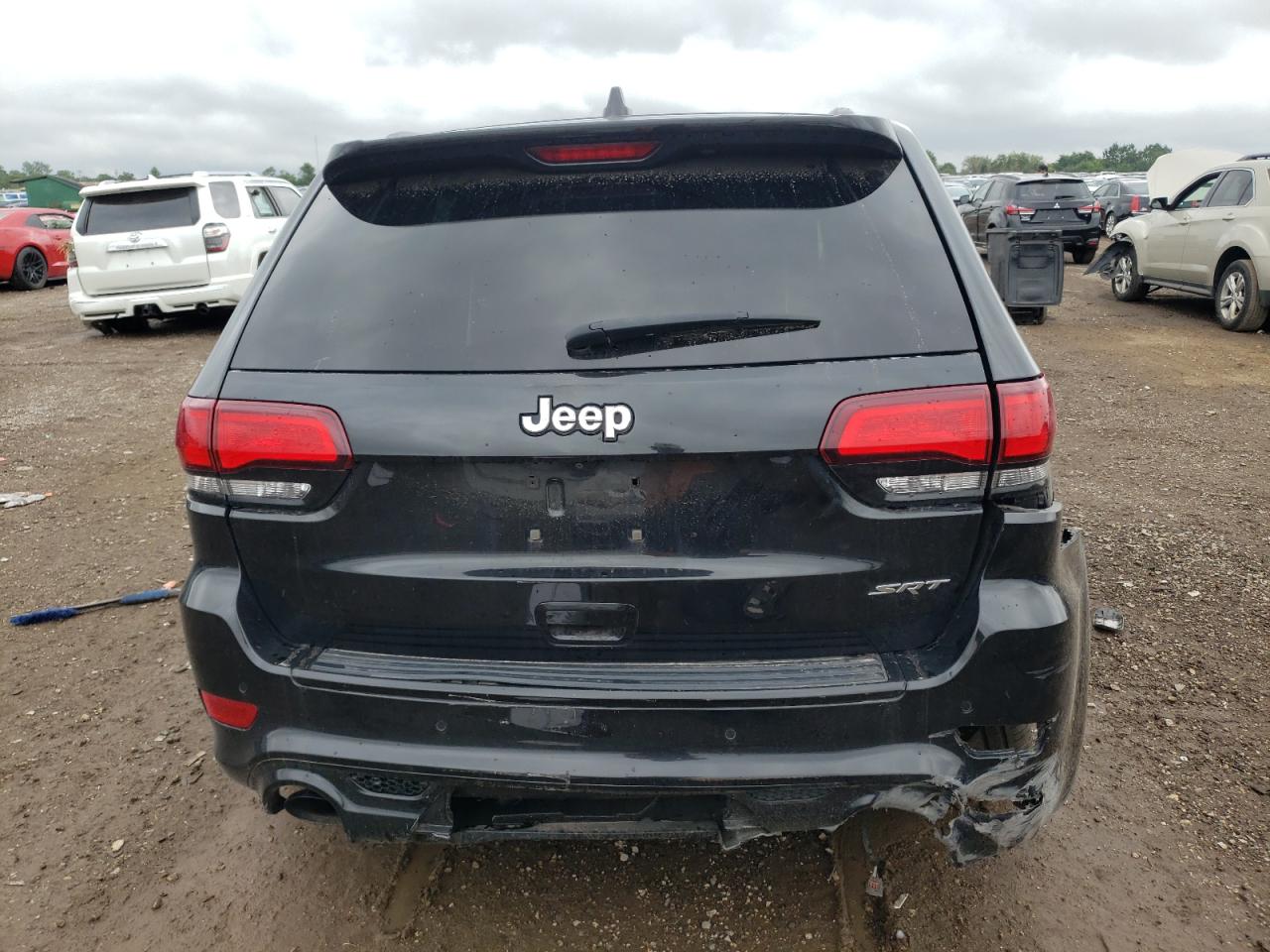 2014 Jeep Grand Cherokee Srt-8 VIN: 1C4RJFDJ2EC583963 Lot: 64584554