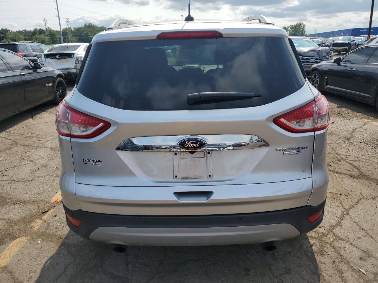2014 Ford Escape Titanium VIN: 1FMCU9J99EUD52704 Lot: 64261394