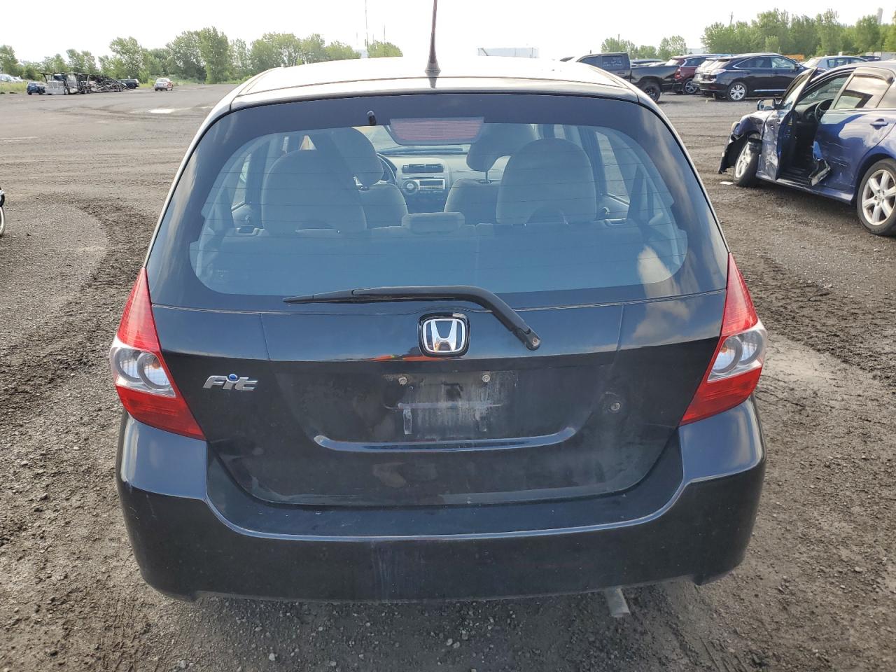 2007 Honda Fit VIN: JHMGD38477S805745 Lot: 64759644