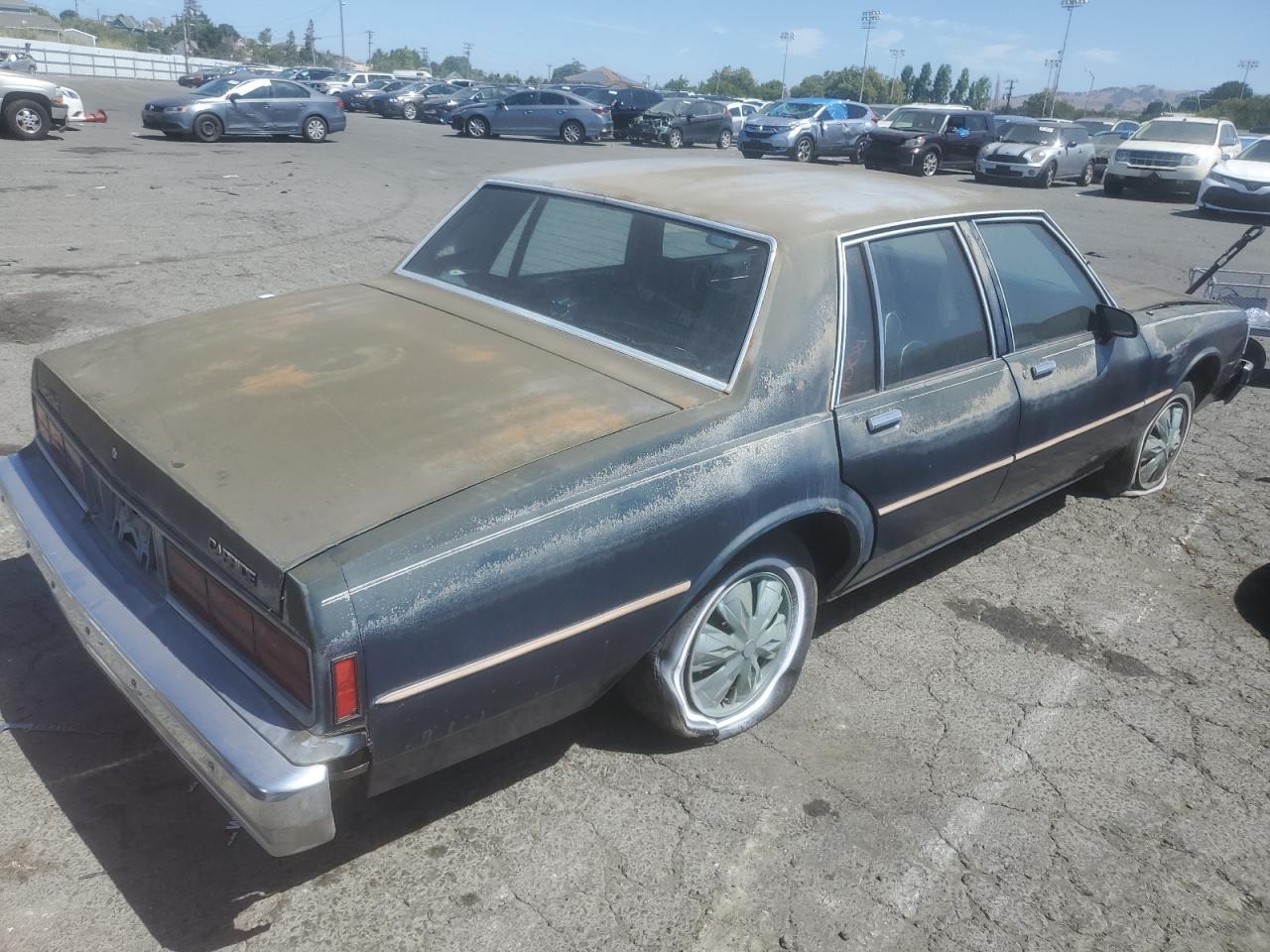 1989 Chevrolet Caprice VIN: 1G1BL51E0KR150236 Lot: 64500224