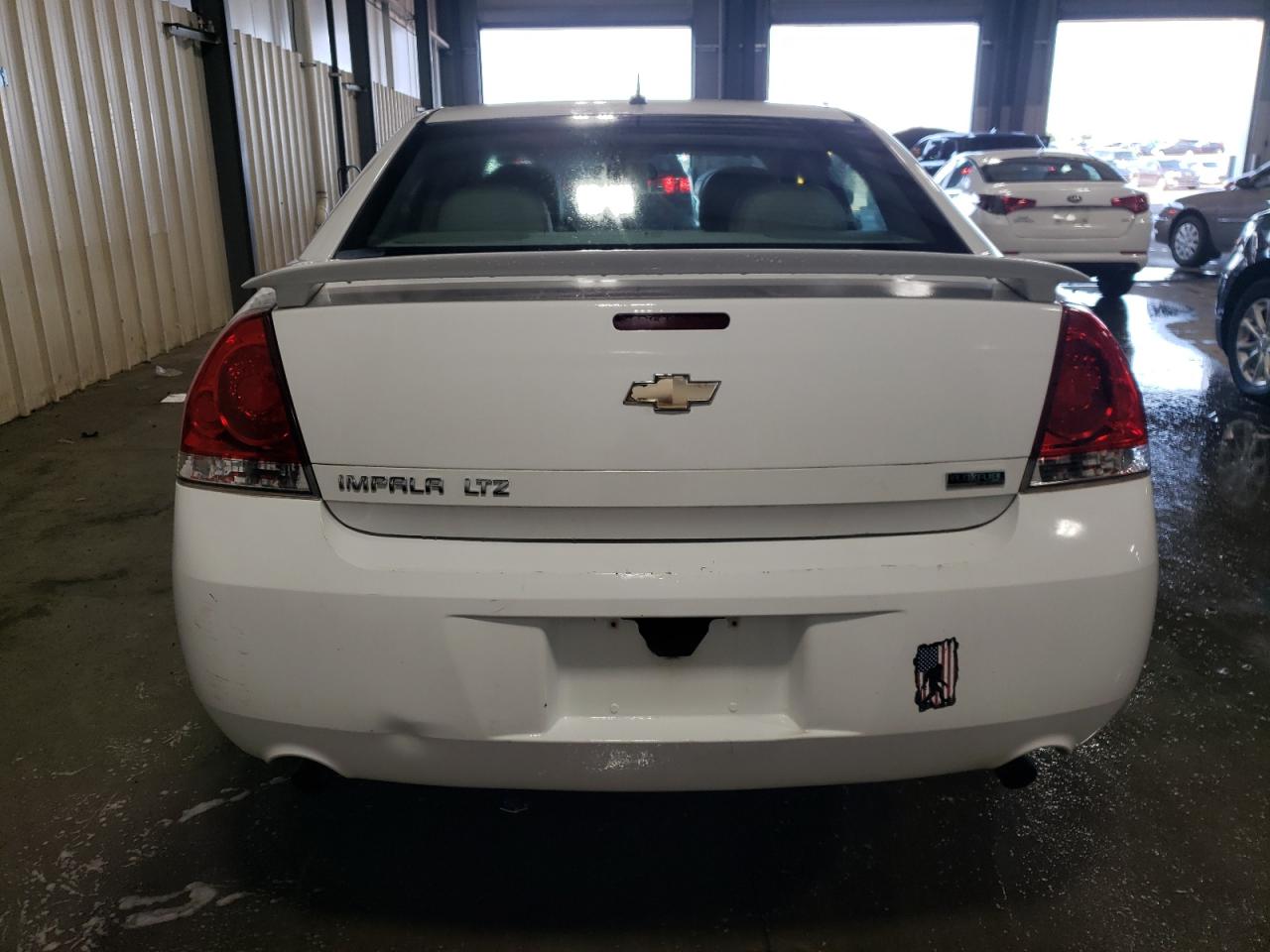 2012 Chevrolet Impala Ltz VIN: 2G1WC5E34C1249131 Lot: 63094324