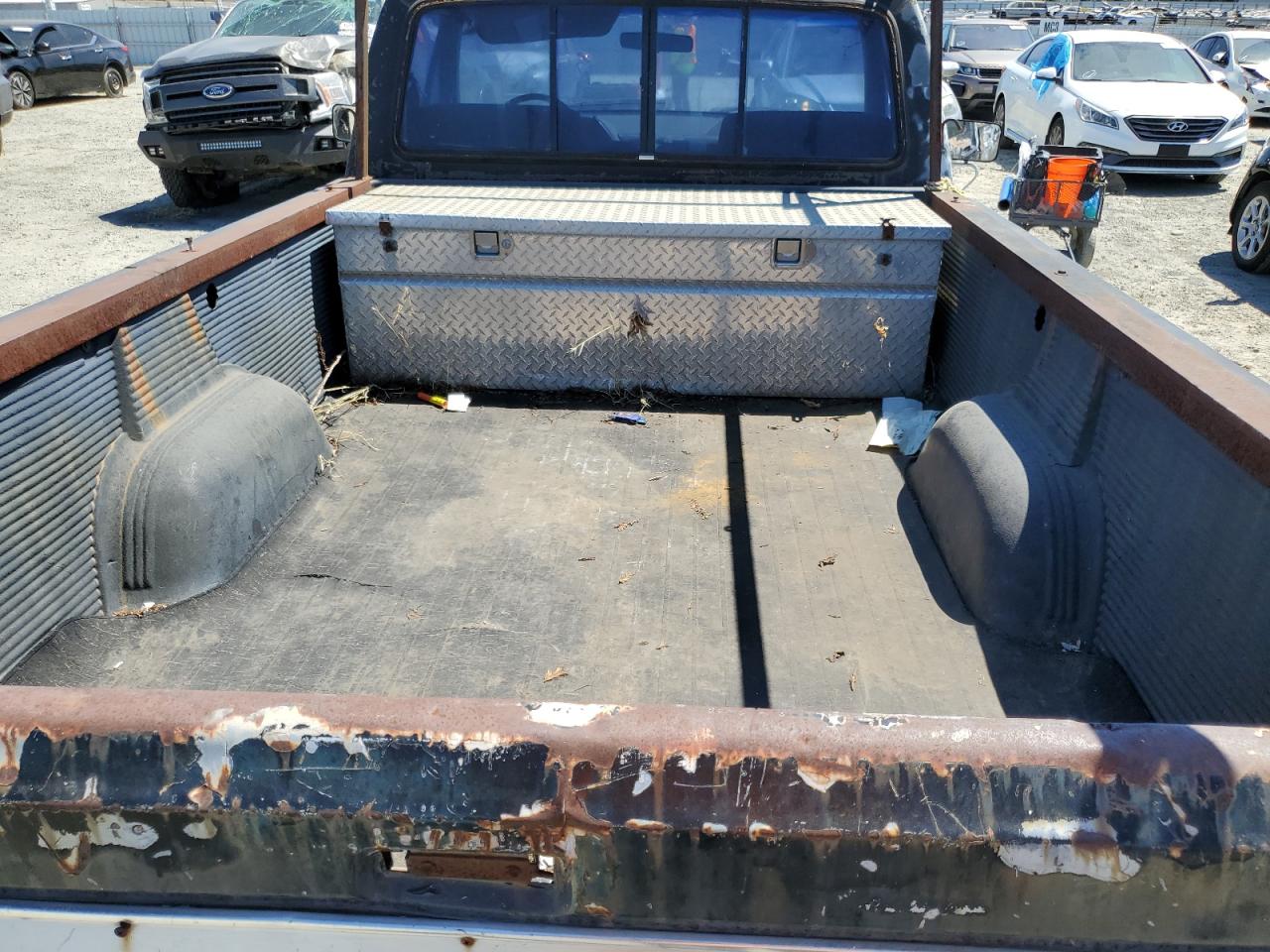 1990 Ford F150 VIN: 2FTDF15N0LCB33607 Lot: 63126844