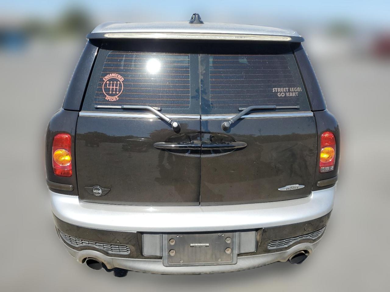 2009 Mini Cooper Clubman Jcw VIN: WMWMM935X9TL04186 Lot: 64040464