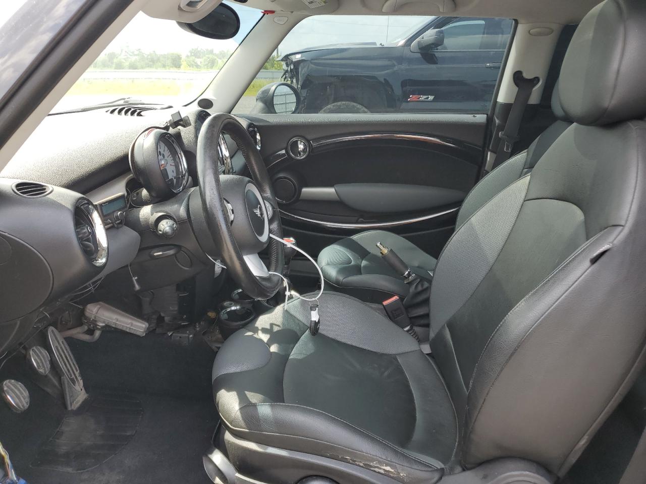 2009 Mini Cooper S VIN: WMWMF73539TX40702 Lot: 63195364