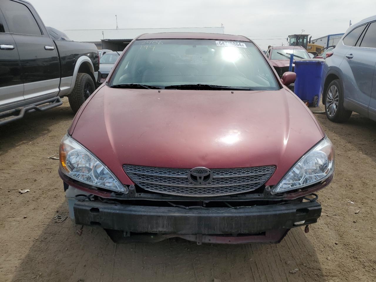 2002 Toyota Camry Le VIN: 4T1BF32K32U017955 Lot: 64776864