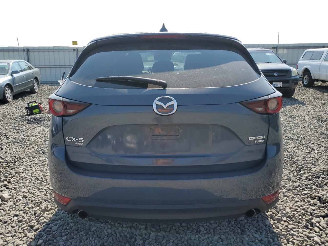 2021 Mazda Cx-5 Carbon Edition VIN: JM3KFBCY8M0341051 Lot: 63625924