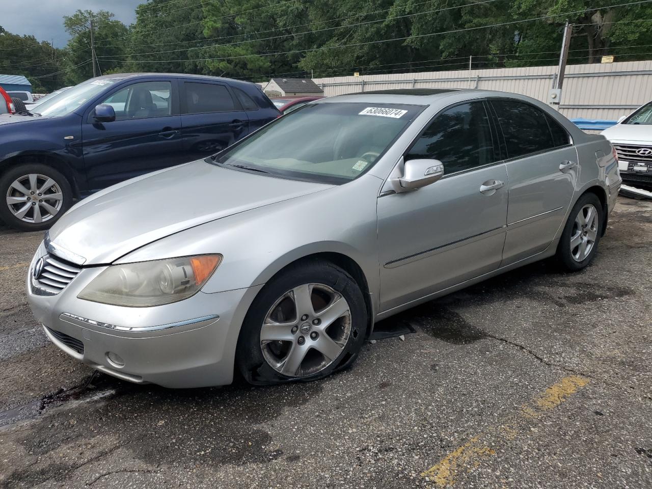 2005 Acura Rl VIN: JH4KB16515C013209 Lot: 63066074