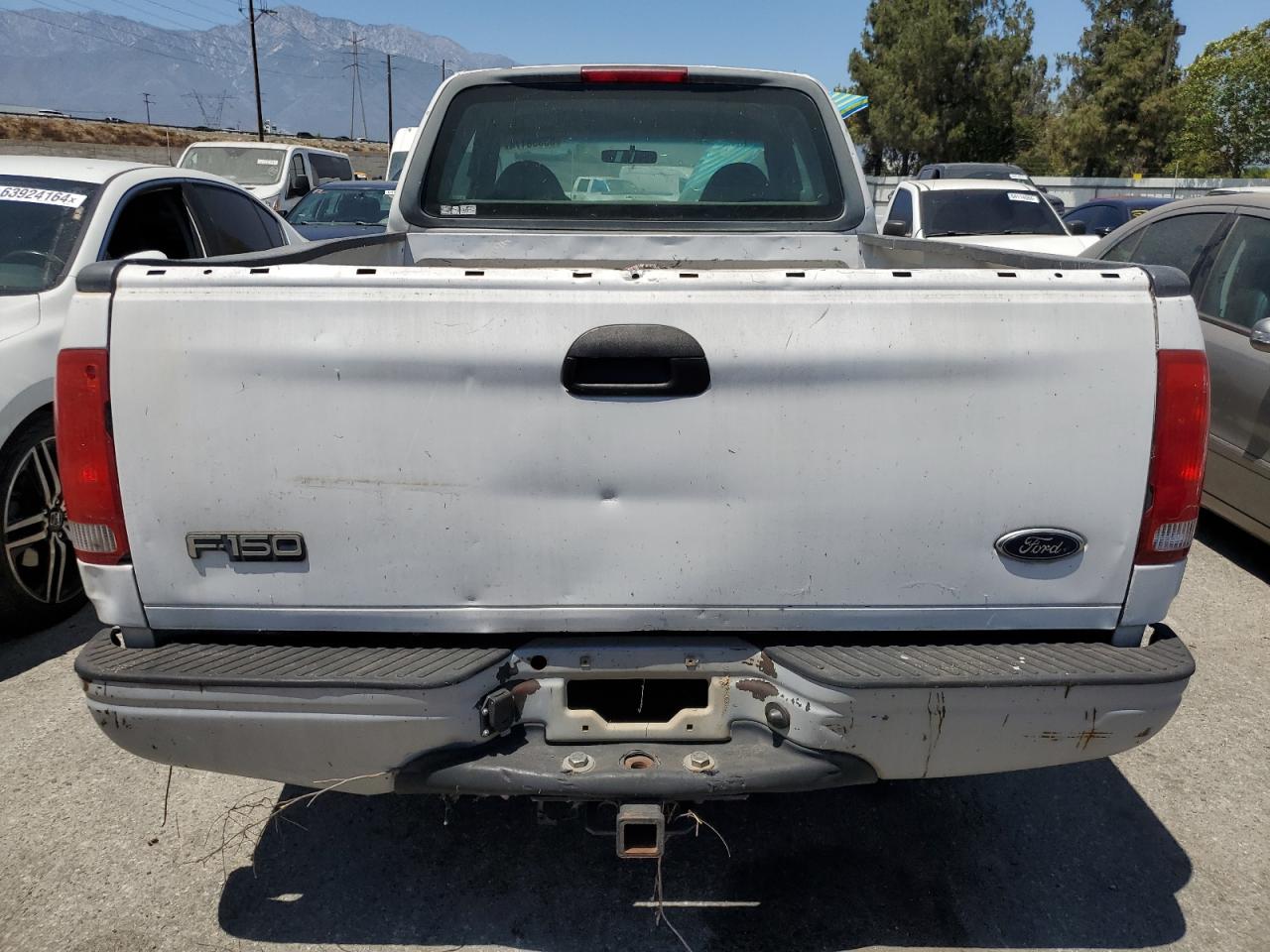 1999 Ford F150 VIN: 1FTZX1726XKC10875 Lot: 63358174